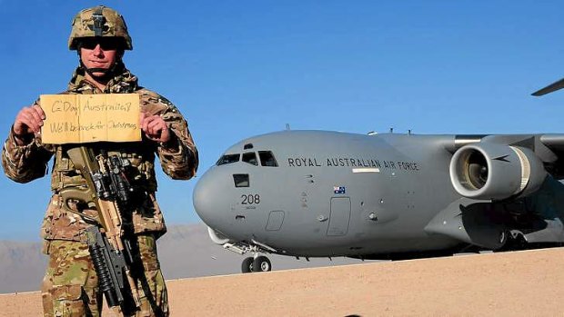 Homeward bound: Leading Aircraftman Noel Klaehn has a welcome message for his family in Australia.