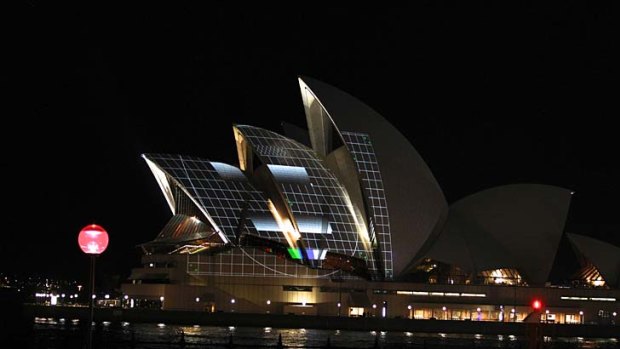 'Lighting the Sails' ... part of the Opera House was lit up last night.