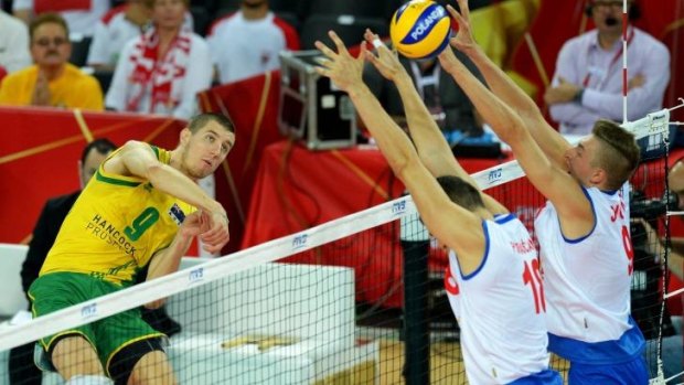 Adam White of Australia spikes the ball during  the Volleyroos' 3-1 loss to Serbia.