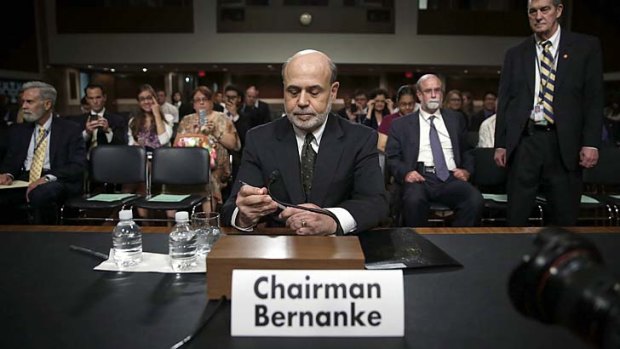Face off ... Ben Bernanke stressed patience as to when to raise interest rates.