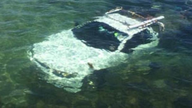 The ute under the water at Mornington.