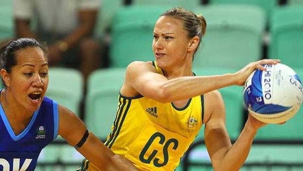 Sharelle McMahon of Australia looks to pass during the preliminary round group A netball match against Samoa.