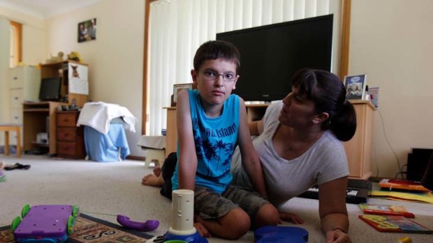 Lifelong suffering ... Debbie Waller says her disabled son, Keeden, 11, would not have been born if she had been warned about the chance of his hereditary condition.