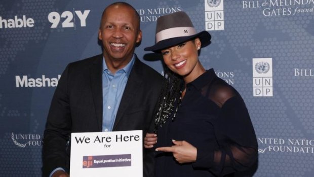 Bryan Stevenson, founder of the Equal Justice Initiative, with singer songwriter Alicia Keys. He will at <i> Canberra Times</i>/ANU Meet the Author event on February 18. 