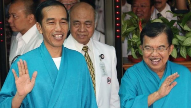 Joko Widodo (left) with his running mate Jusuf Kalla.