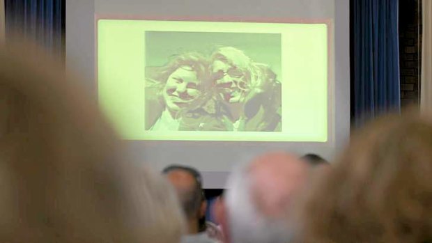 Images of Noelene and Yvana Bischoff are shown during a memorial service for the mother and daughter.