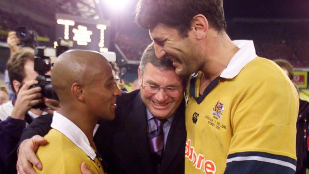 Rod Macqueen, George Gregan (left) and John Eales after beating the Lions in 2001.