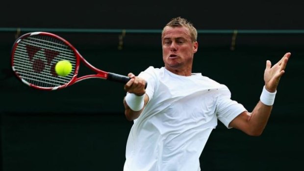 Lleyton Hewitt plays a forehand against Michal Przysiezny of Poland.