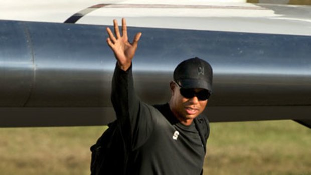 Tiger Woods arrives at Essendon airport.