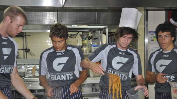 Jon Giles, Alex Carey, Tom Bugg and Dylan Shiel find making pasta is all part of their new routine.