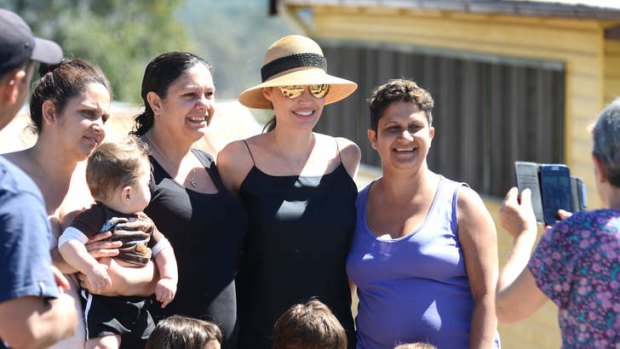 Angelina Jolie meeting locals at Werris Creek, NSW, during location scouting last month.