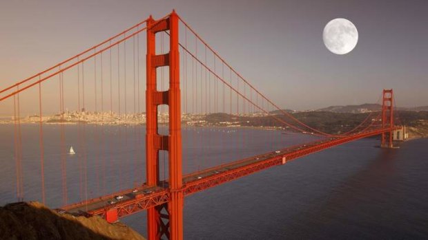 Breathtaking: Full moon over Golden Gate Bridge, San Francisco.