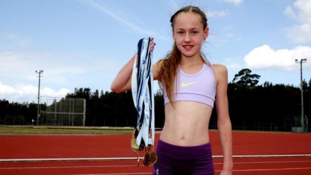 Family ties propel little champion: Imogen Smith currently holds four world records. 