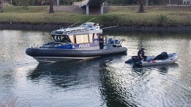 Police search the Maribyrnong River.