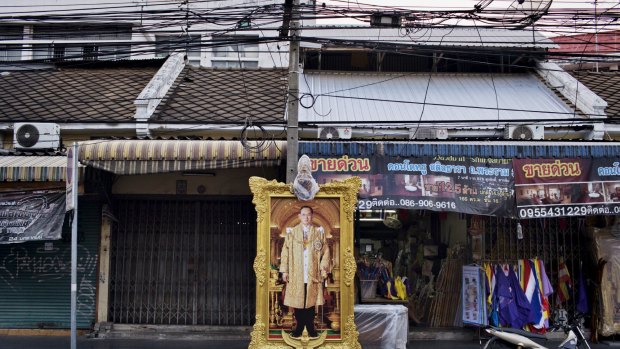 A framed image of King Bhumibol Adulyadej of Thailand, in Bangkok.

