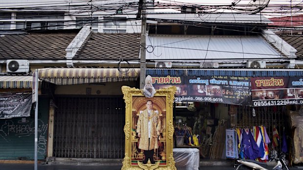 A framed image of King Bhumibol Adulyadej of Thailand, in Bangkok.

