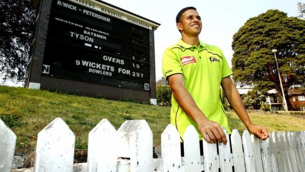 Usman Khawaja pictured after re-signing for the Sydney Thunder.