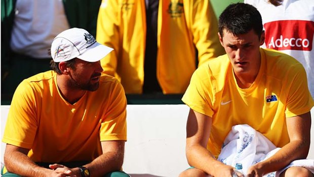 Will there be a reunion? ... Bernard Tomic and team captain Pat Rafter.