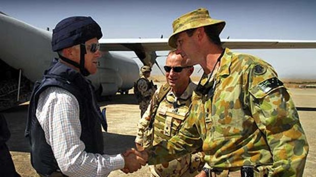 Sighted at last ... Malcolm Turnbull is welcomed to Afghanistan by Lieutenant-Colonel Peter Connolly.