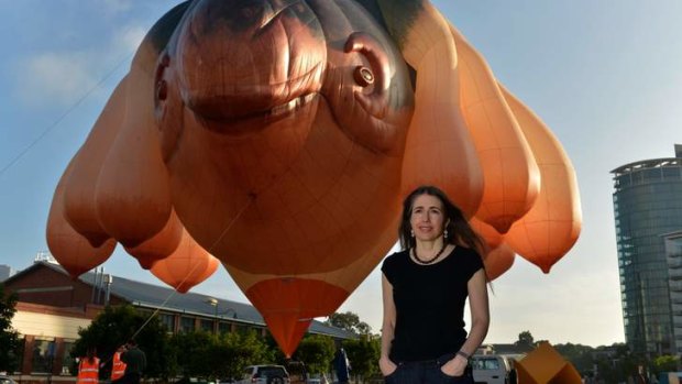 Artist Patricia Pinccinini with her Skywhale hovering above the ACCA forecourt, marking one of the art-beast's rare public appearances.