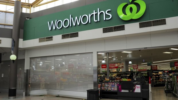 Packets of cigarettes were littered around the front of the Woolworths store at the Calwell Centre. 