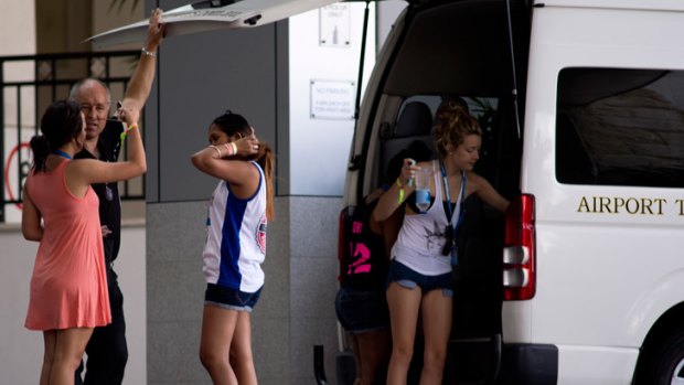 Schoolies leave the Chevron Renaissance at Surfers Paradise after a teenage girl plunged to her death from a balcony at the hotel.