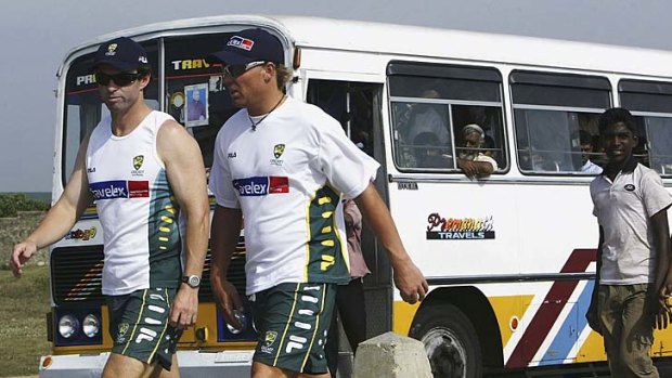 Workloads ... Shane Warne and Jock Campbell walk the streets of Galle, Sri Lanka in 2004.       *** Local Caption *** Shane Warne;Jock Campbell
