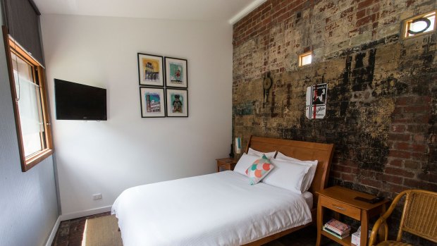  An old stables in the backyard of a Richmond home has been transformed into a guest room.