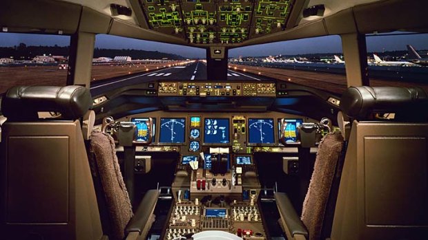 The flight deck of a Boeing 777.