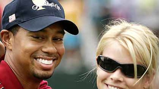 Trying to save his marriage ... Tiger Woods, pictured with his wife Elin, top. And below, the house she has bought in Sweden.
