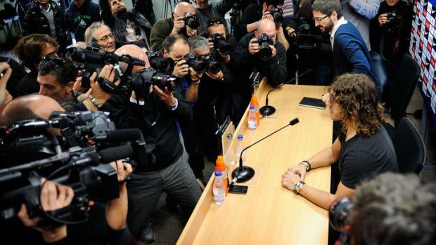 Carles Puyol during a press conference to announce he will be leaving the Catalan club at the end of the season.