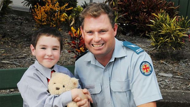 Bailey Fuller meets the voice on the other end of the line - emergency medical dispatcher Matt Salter. Bailey, 5, talked to Mr Salter when his mother collapsed at their Gympie home last month.