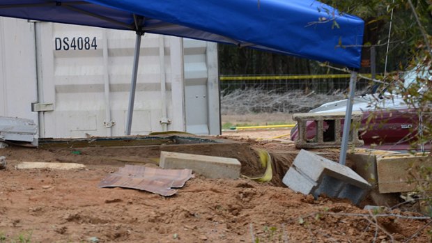A tarpaulin covers the underground bunker where Ethan was held captive.