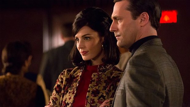 Megan Draper (Jessica Paré) and Don Draper (Jon Hamm).