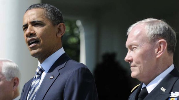 Awaiting final approval tests ... General Martin Dempsey pictured with Barack Obama.