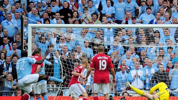 Manchester City's Yaya Toure (42) scores the only goal of the FA Cup final.