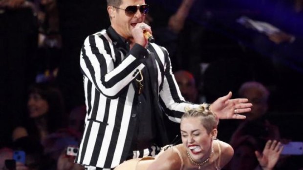 Miley Cyrus and Robin Thicke perform their controversial version of 'Blurred Lines' at the 2013 MTV Video Music Awards.