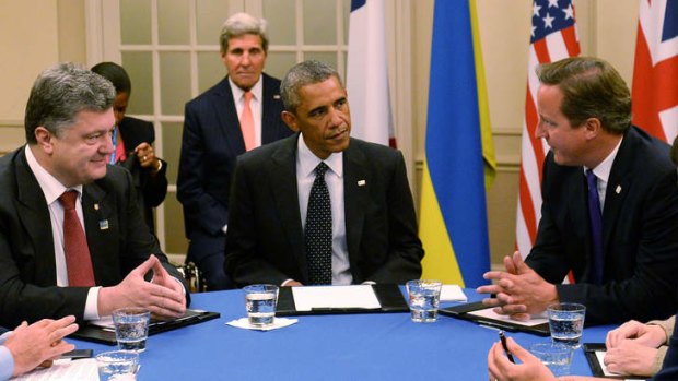 Round table: British Prime Minister David Cameron, US President Barack Obama and Ukrainian President Petro Poroshenko.