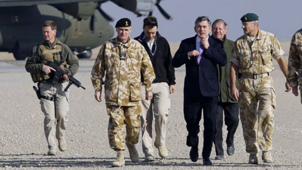 Gordon Brown meets soldiers in southern Afghanistan. "British people are safer today because we have our troops working with the Afghan people to act against terror,'' he said.