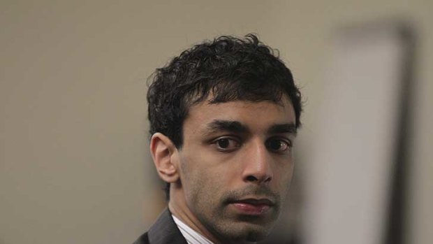 Accused of spying on his roommate ... Dharun Ravi listens to testimony during his trial.