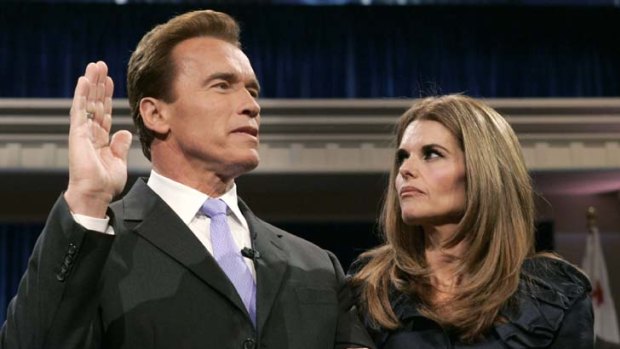 Happier times...Schwarzenegger with wife Maria, being sworn in as governor.