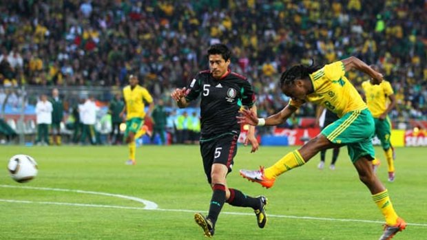 Siphiwe Tshabalala of South Africa scores the first goal of the 2010 FIFA World Cup.
