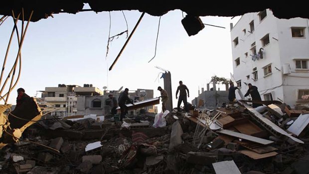 Obliterated ... the office of the Hamas TV channel Al-Aqsa, which was hit on Sunday morning, injuring journalists.