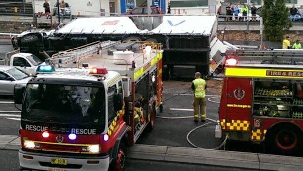 A truck has overturned at the intersection of Warringah Road and Pittwater Road.