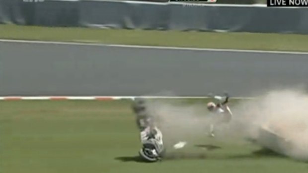 Crash: Casey Stoner is thrown from his bike.