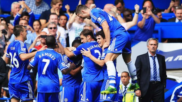 Faith pays off: Frank Lampard of Chelsea celebrates with team mates after scoring the second goal against Hull City.