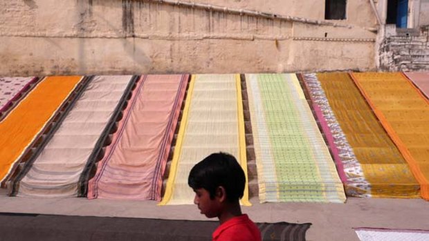 Versatile ... saris drying on the banks of the Ganges.