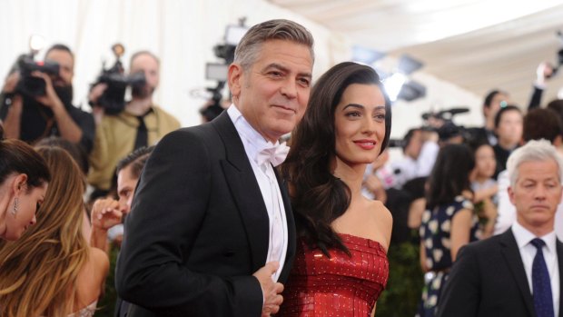 George Clooney and Amal Clooney arrive at The Metropolitan Museum of Art's 
2015 Costume Institute benefit gala celebrating "China: Through the Looking Glass" in New York.