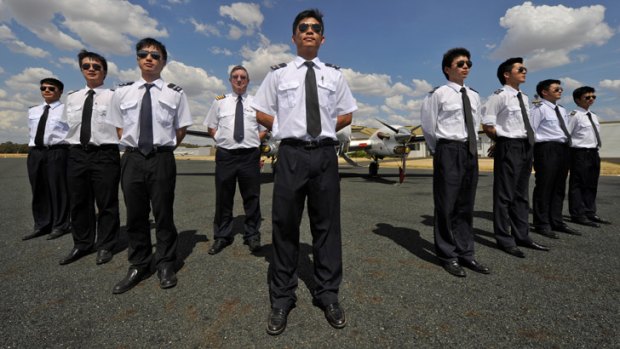 Forming a V-wing: Some of the Chinese trainee pilots on the runway at the  Mangalore airport.