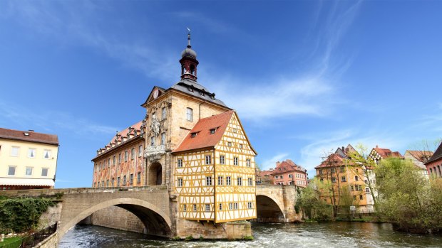 The trail runs past the town hall on the bridge in Bamberg, Germany.